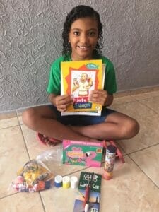 Young girl loving books is returning to school