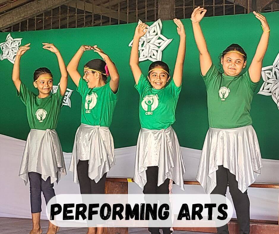 four girls dancing ballet on stage at cbc